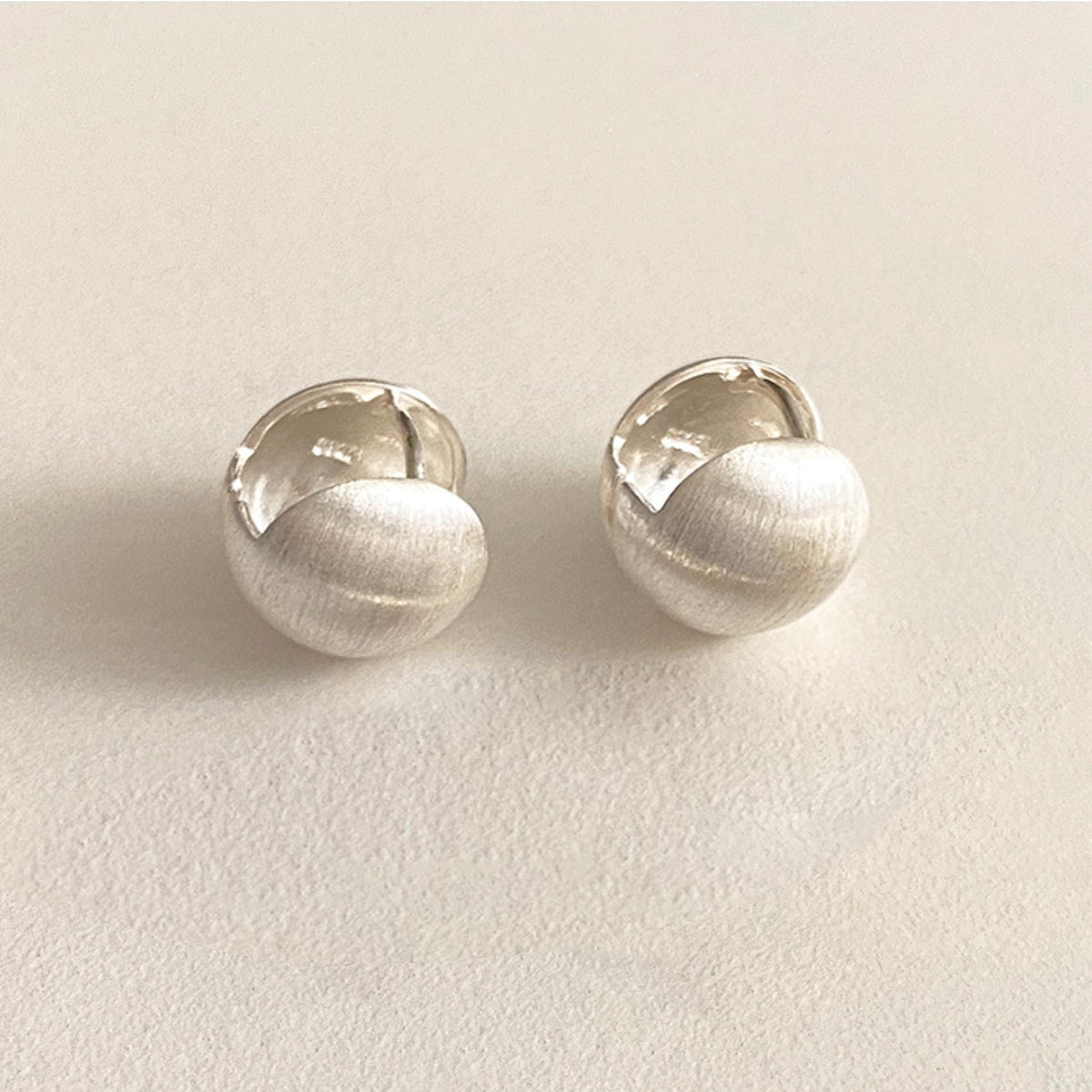 Matte Silver Ball Huggie Earrings