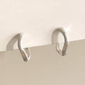 Matte Wave Huggie Earrings