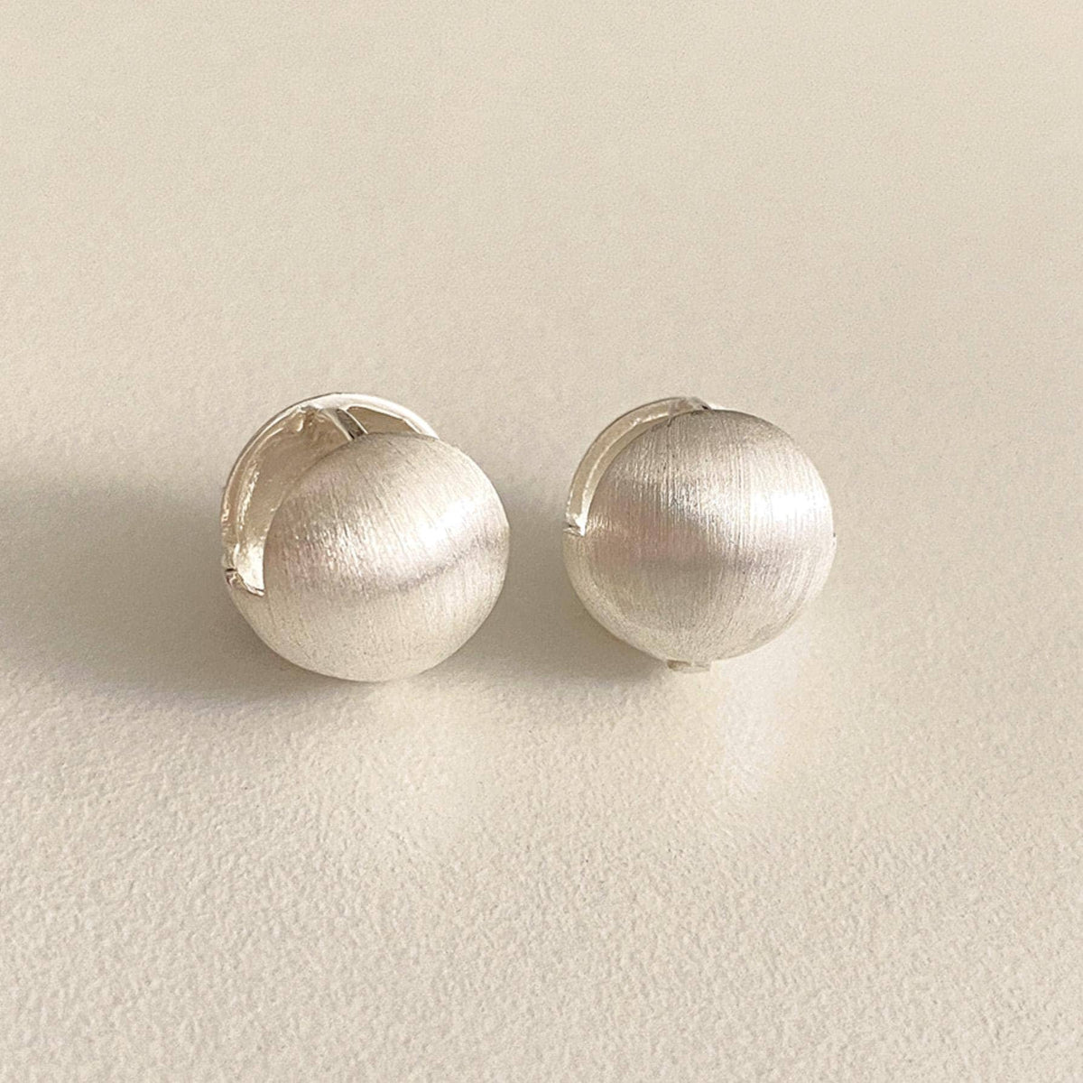 Matte Silver Ball Huggie Earrings