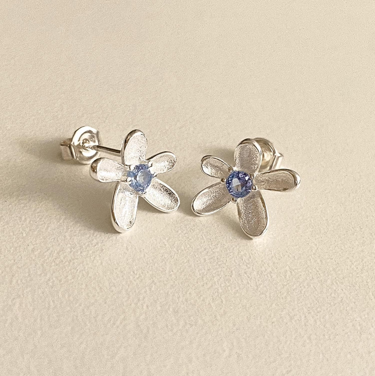 Floral Stud Earrings with Blue Cubic Zirconia