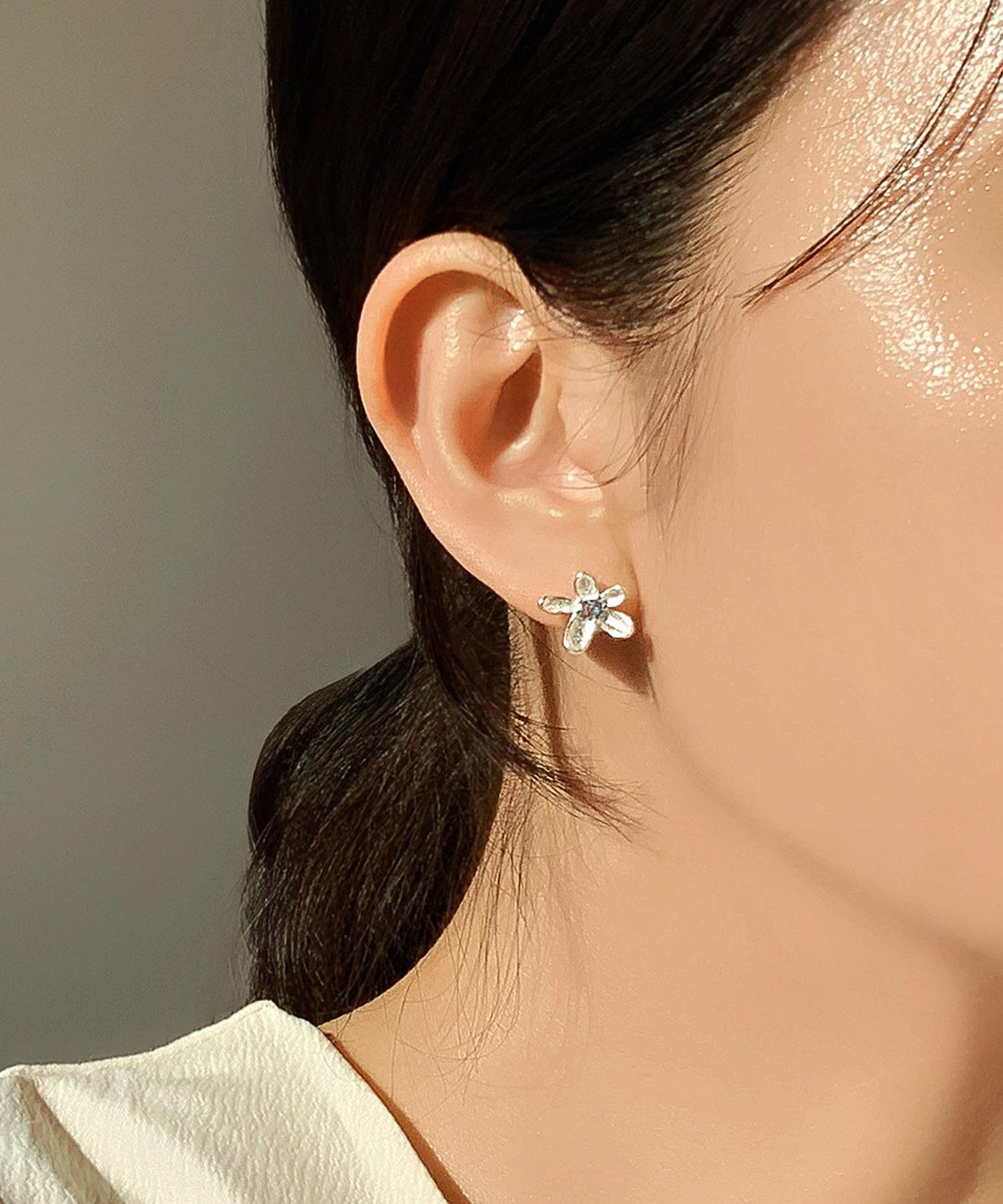 Floral Stud Earrings with Blue Cubic Zirconia