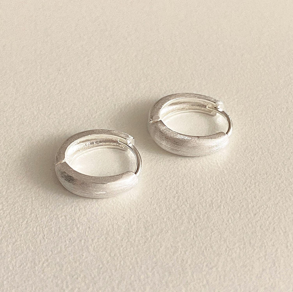 Matte Silver Chunky Oval Huggie Earrings