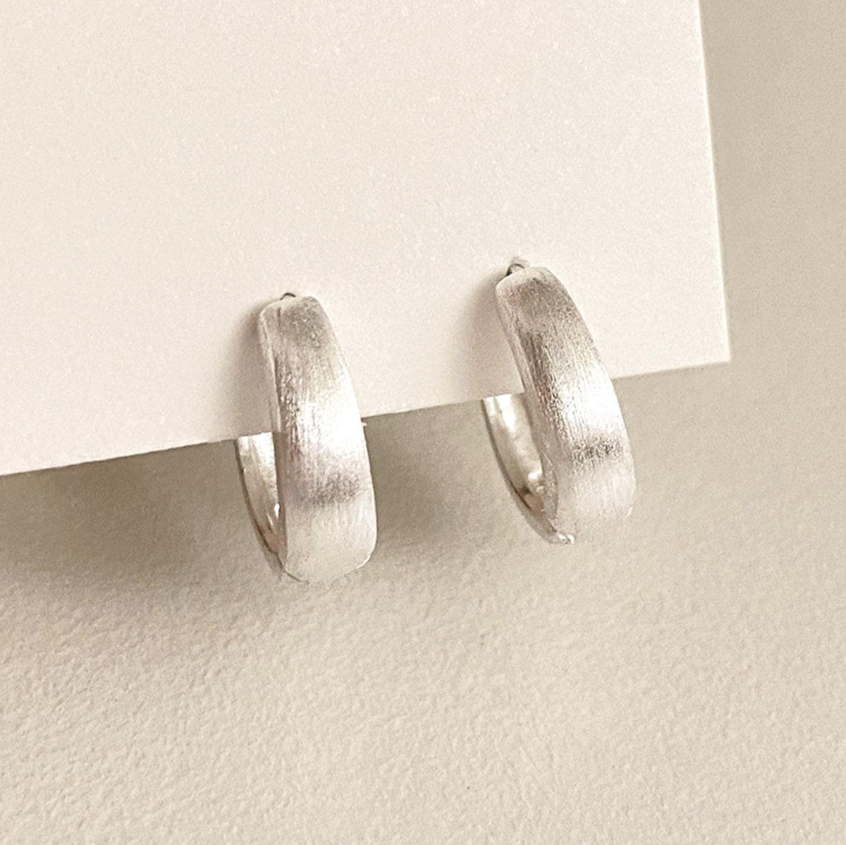 Matte Silver Chunky Oval Huggie Earrings