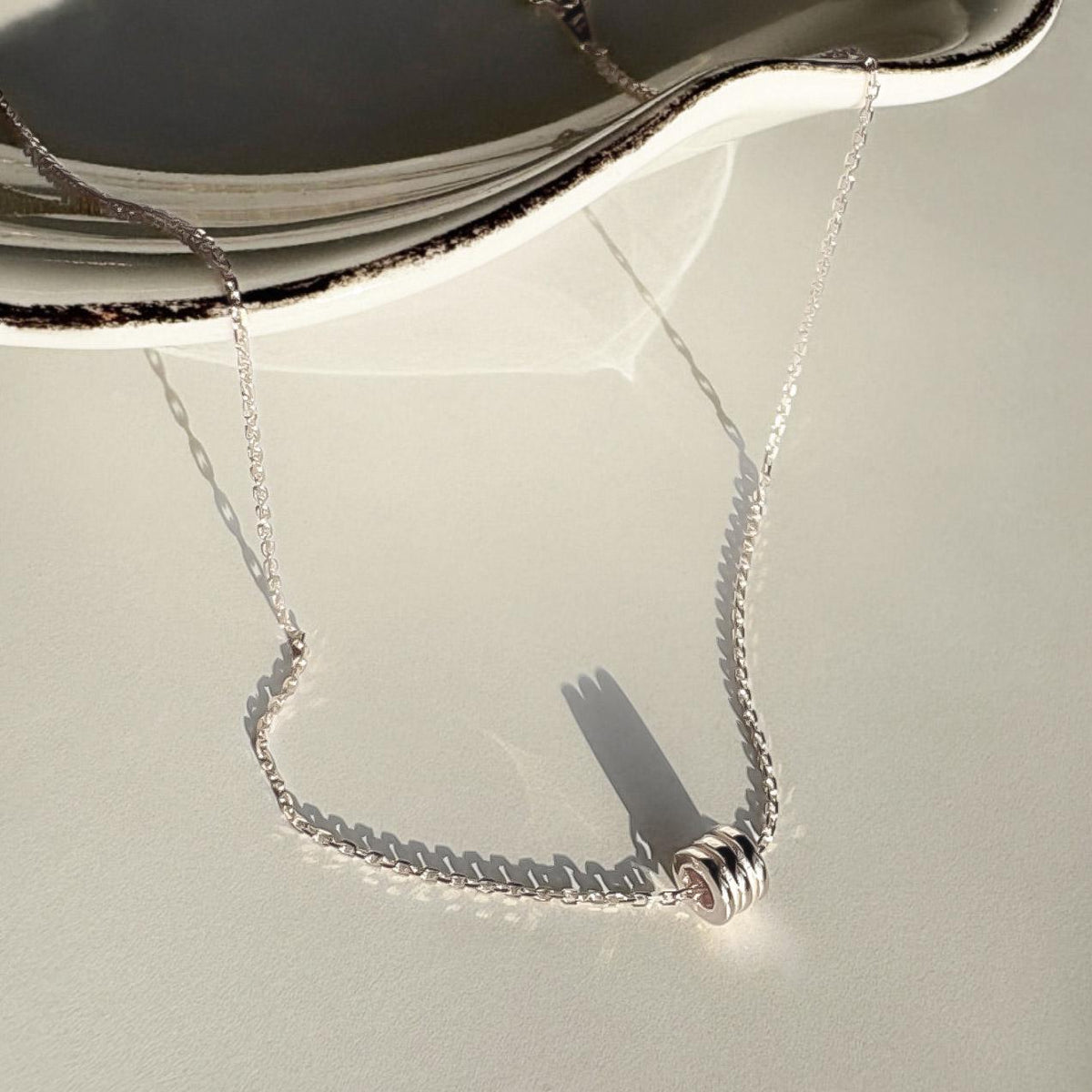 Triple Silver Ring Pendant Necklace