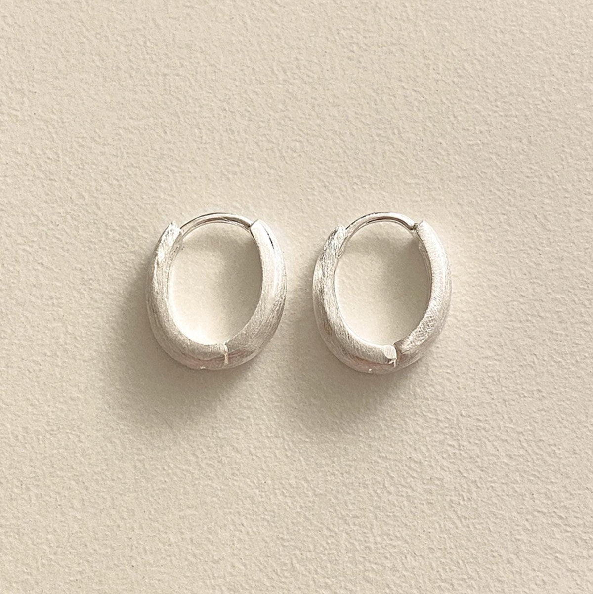 Matte Silver Chunky Oval Huggie Earrings