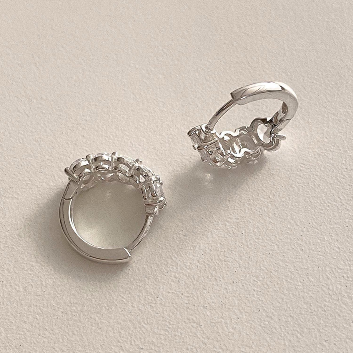 Oval CZ Cluster Huggie Earrings