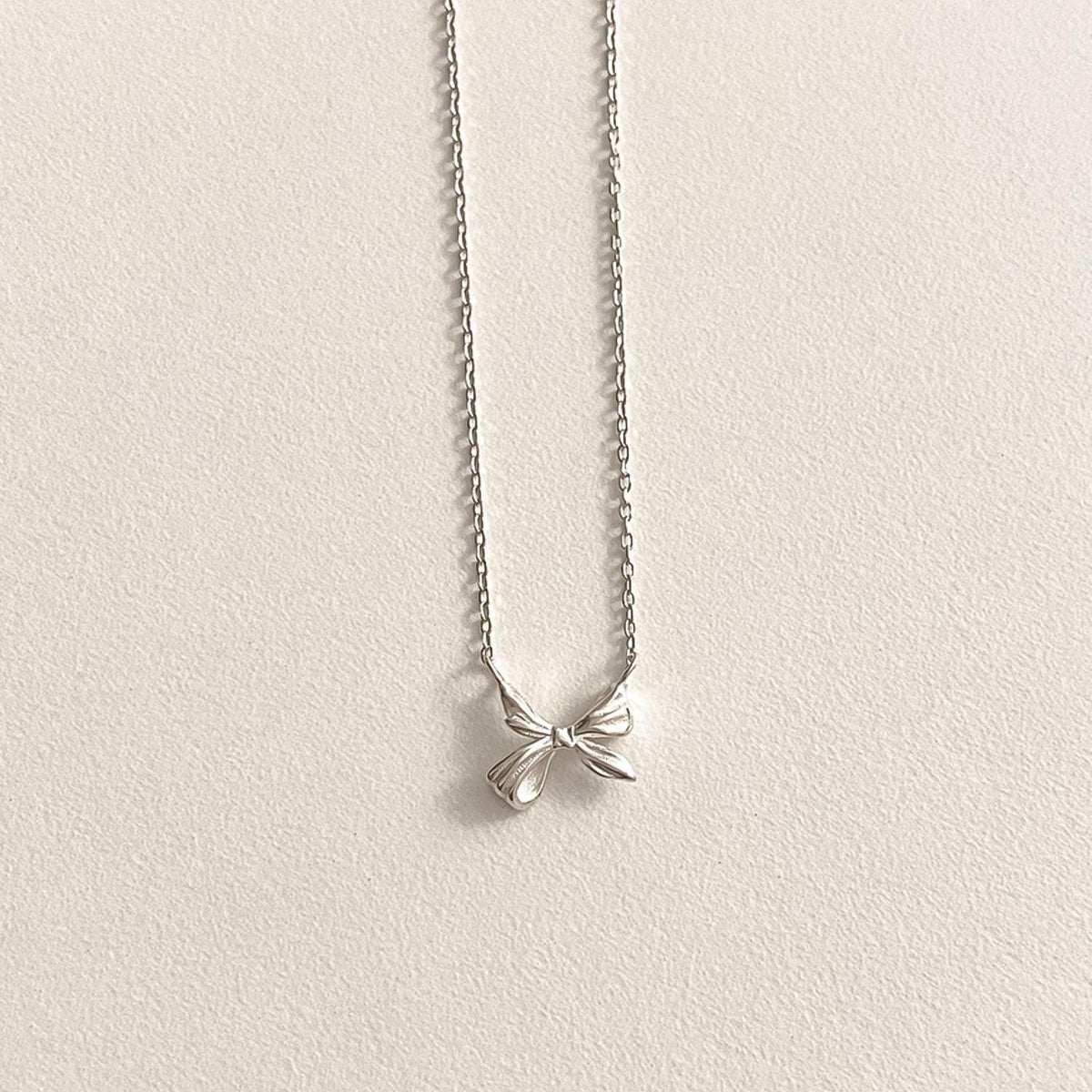 Mini Sculpted Ribbon Bow Necklace