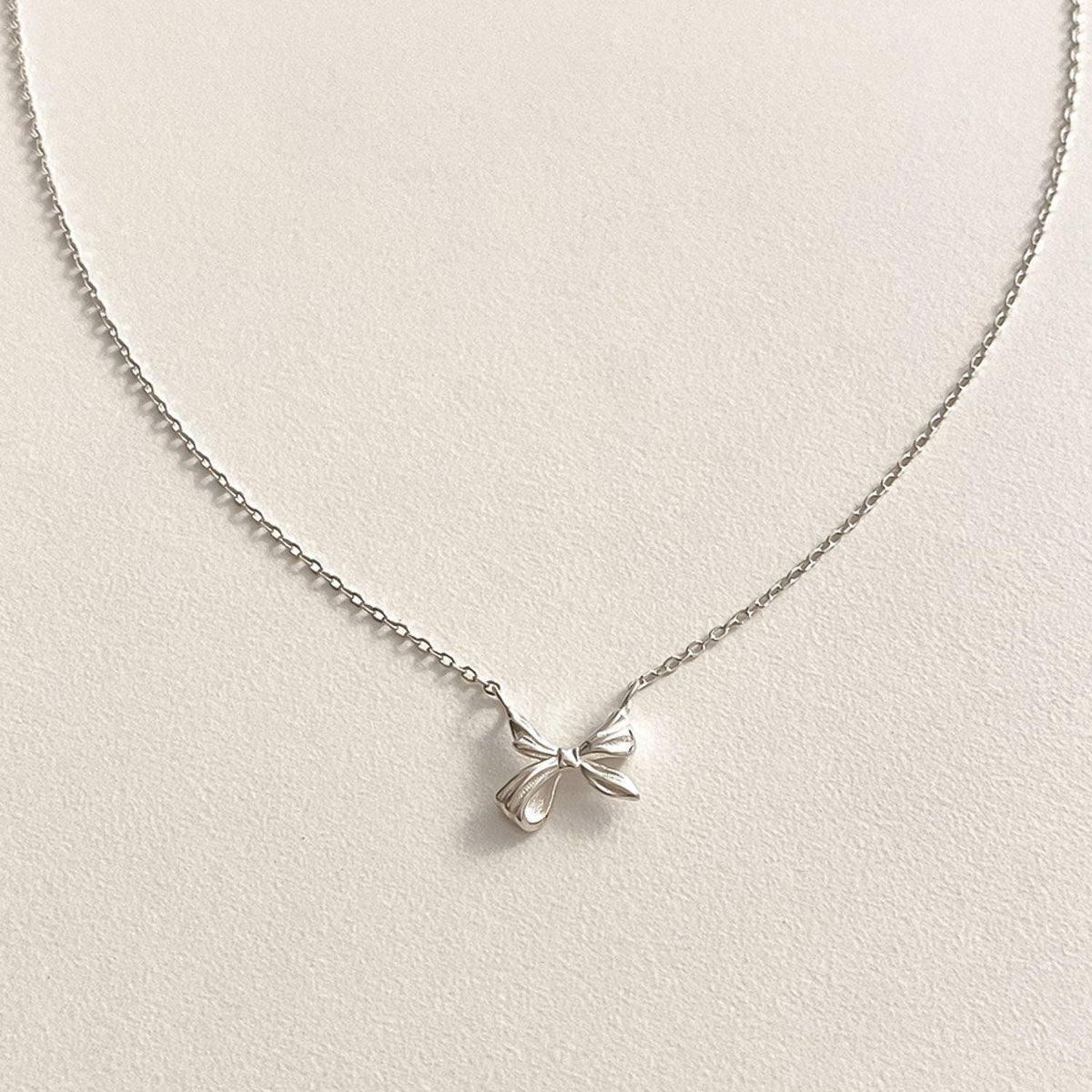 Mini Sculpted Ribbon Bow Necklace