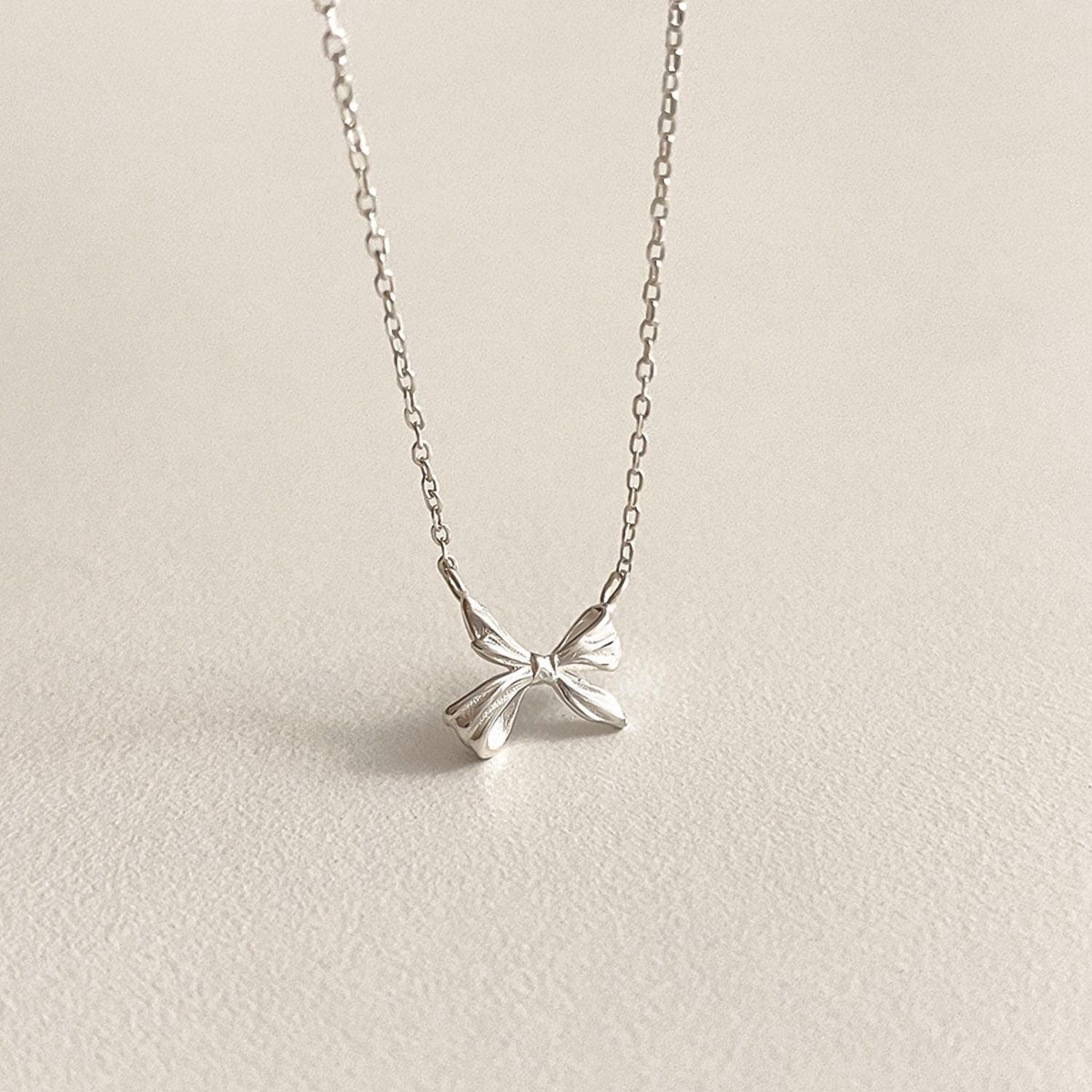 Mini Sculpted Ribbon Bow Necklace
