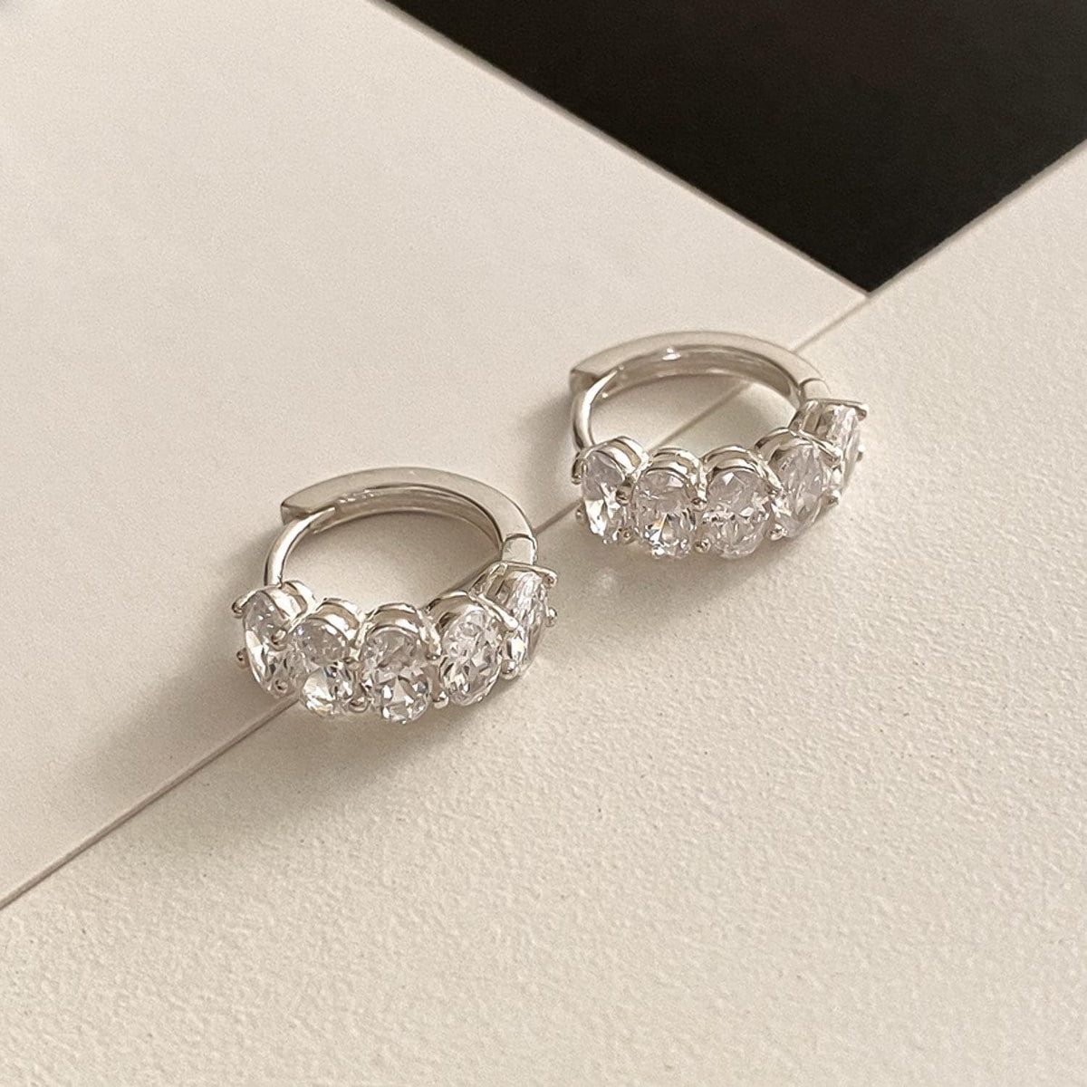 Oval CZ Cluster Huggie Earrings