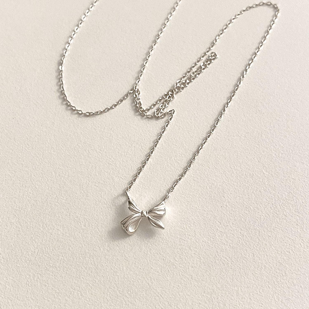 Mini Sculpted Ribbon Bow Necklace