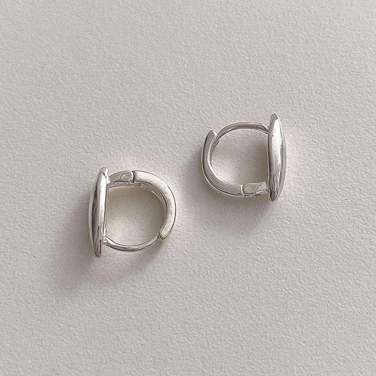 Mini Oval Dome Huggie Earrings