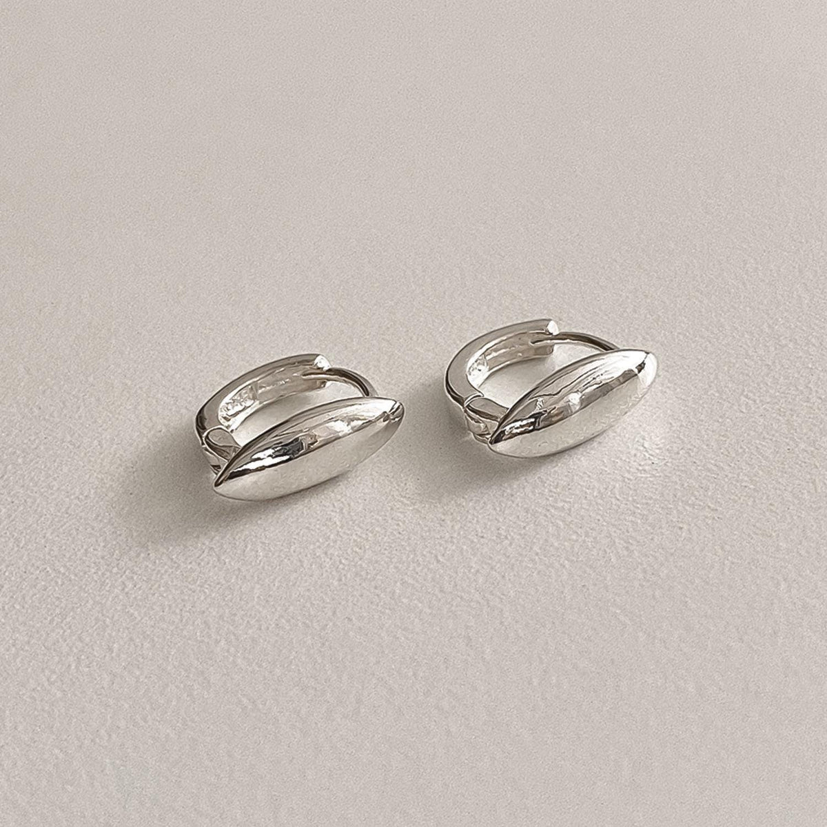 Mini Oval Dome Huggie Earrings