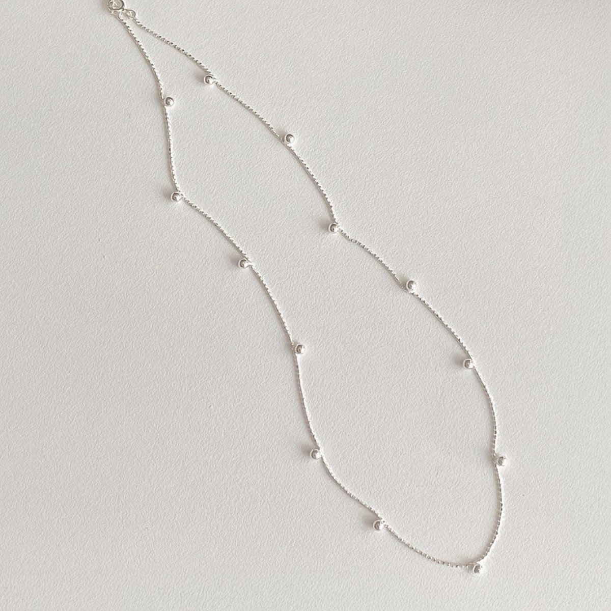 Dangling Silver Ball Necklace