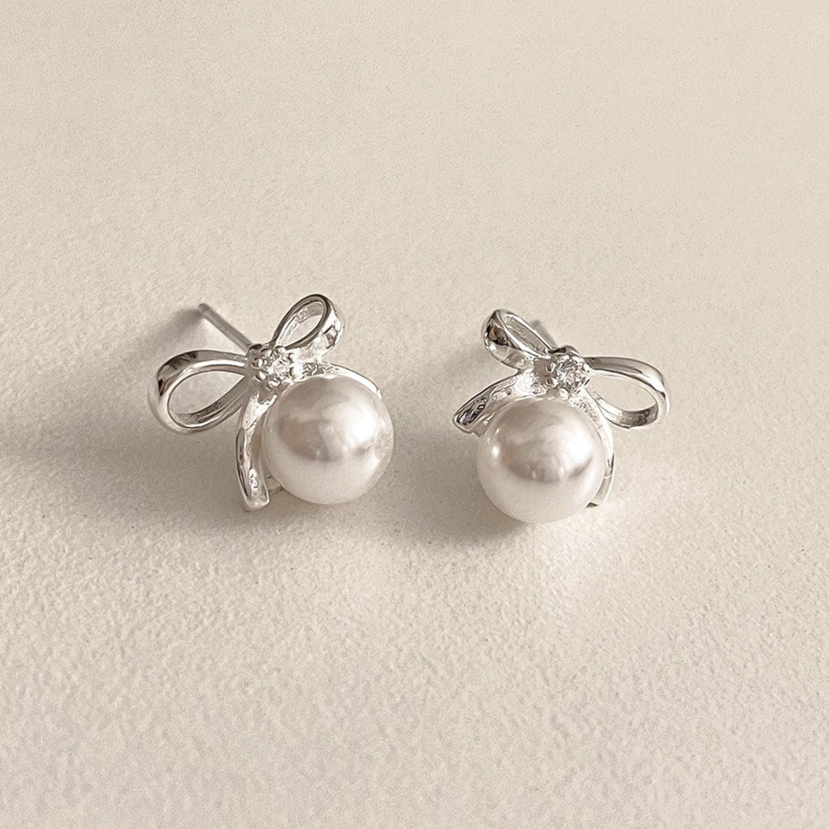 Bow Pearl Stud Earrings