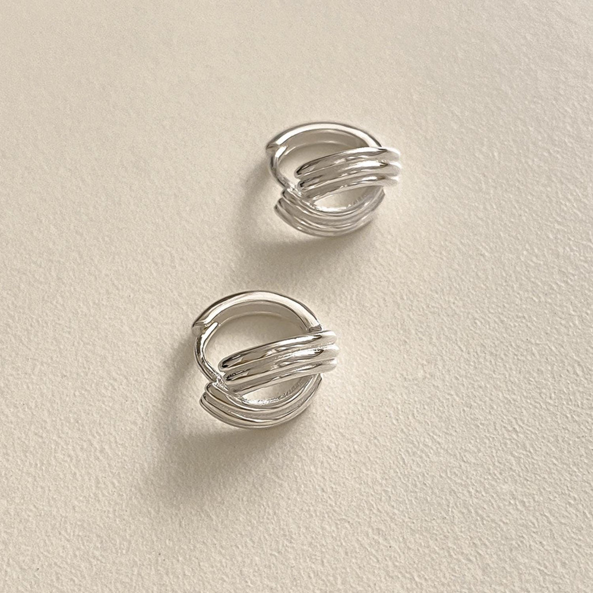 Ripple Curve Huggie Earrings