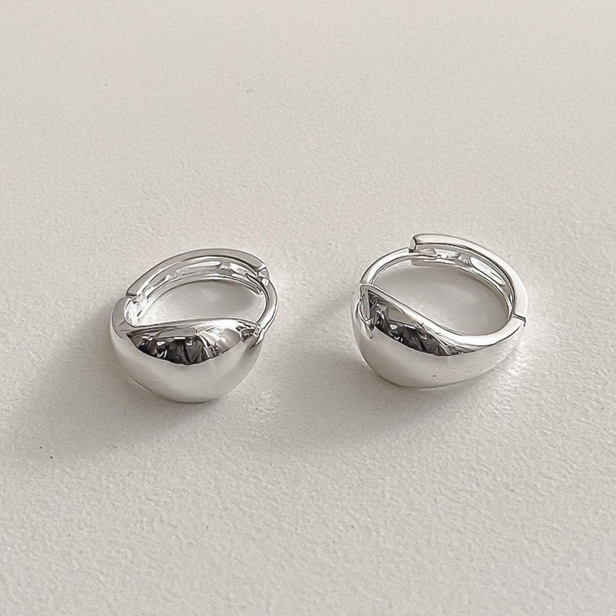 Sculptural Oval Dome Huggie Earrings