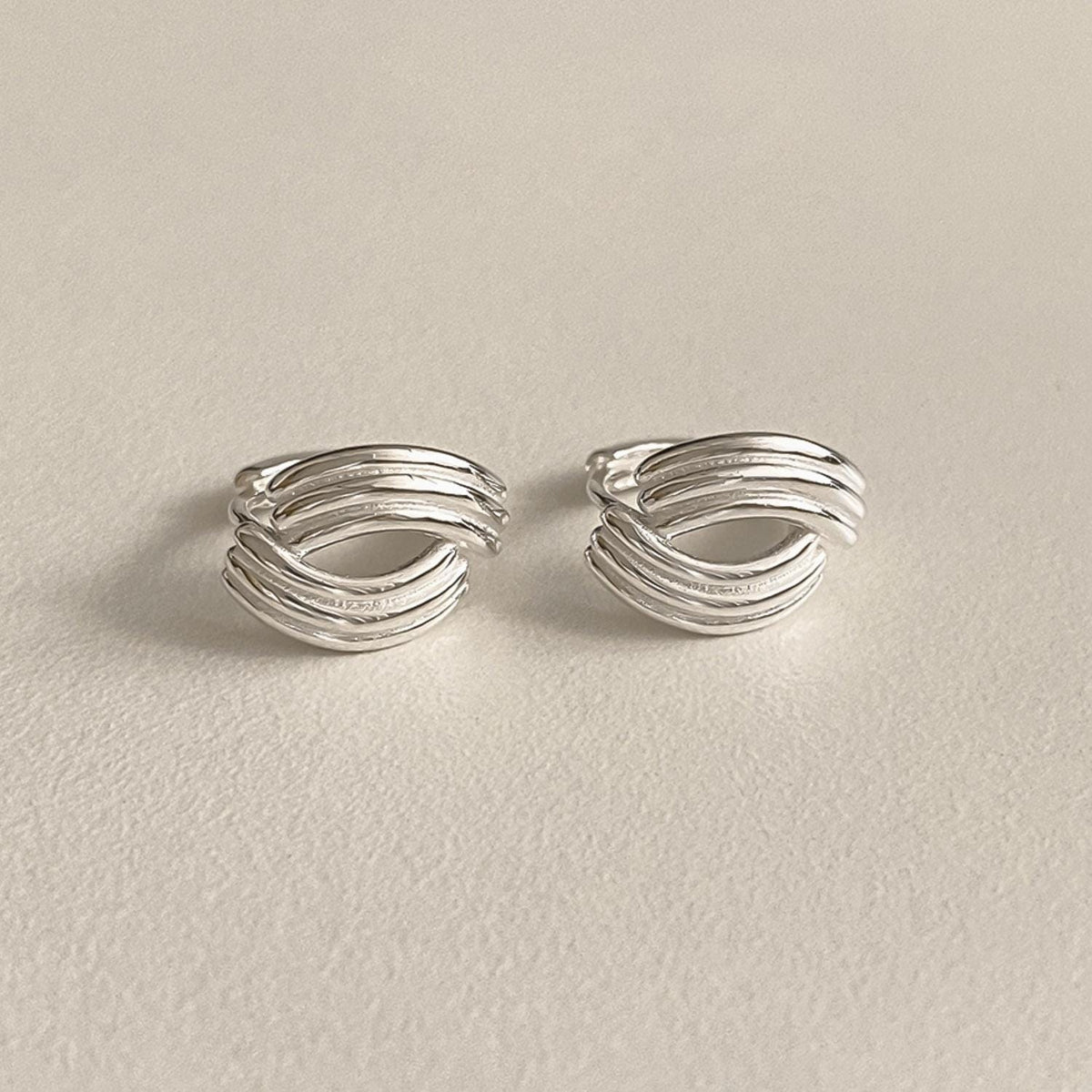 Ripple Curve Huggie Earrings
