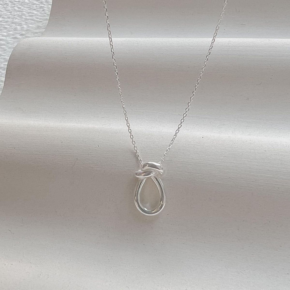 Knotted Teardrop Pendant Necklace