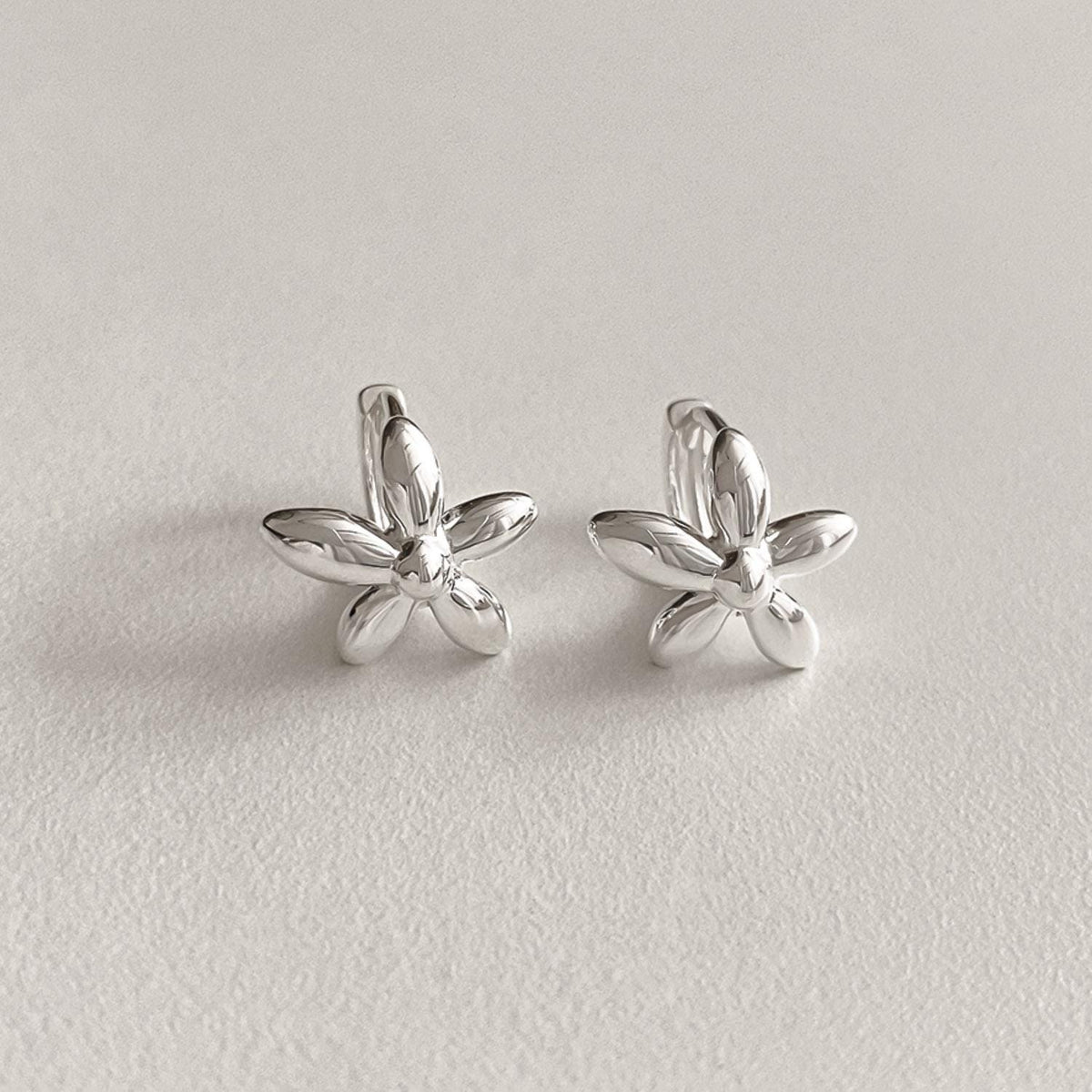 Bold Flower Huggie Earrings