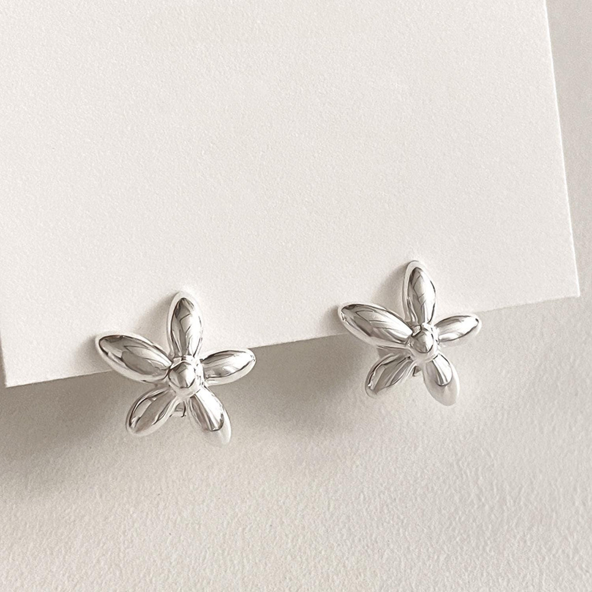 Bold Flower Huggie Earrings
