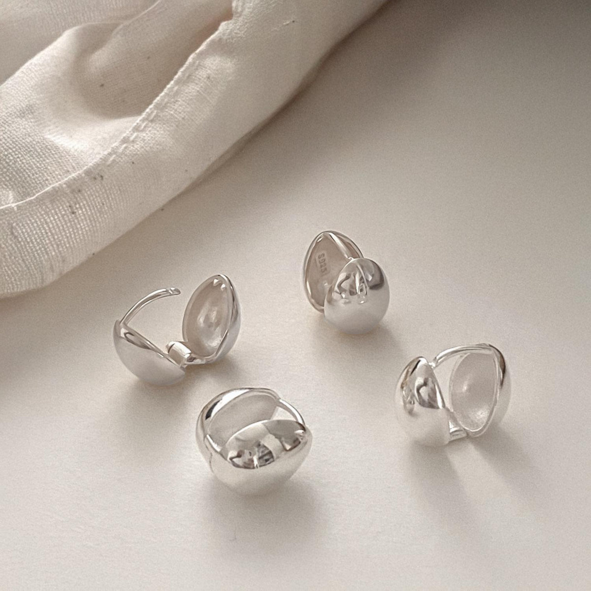 Teardrop Dome Huggie Earrings