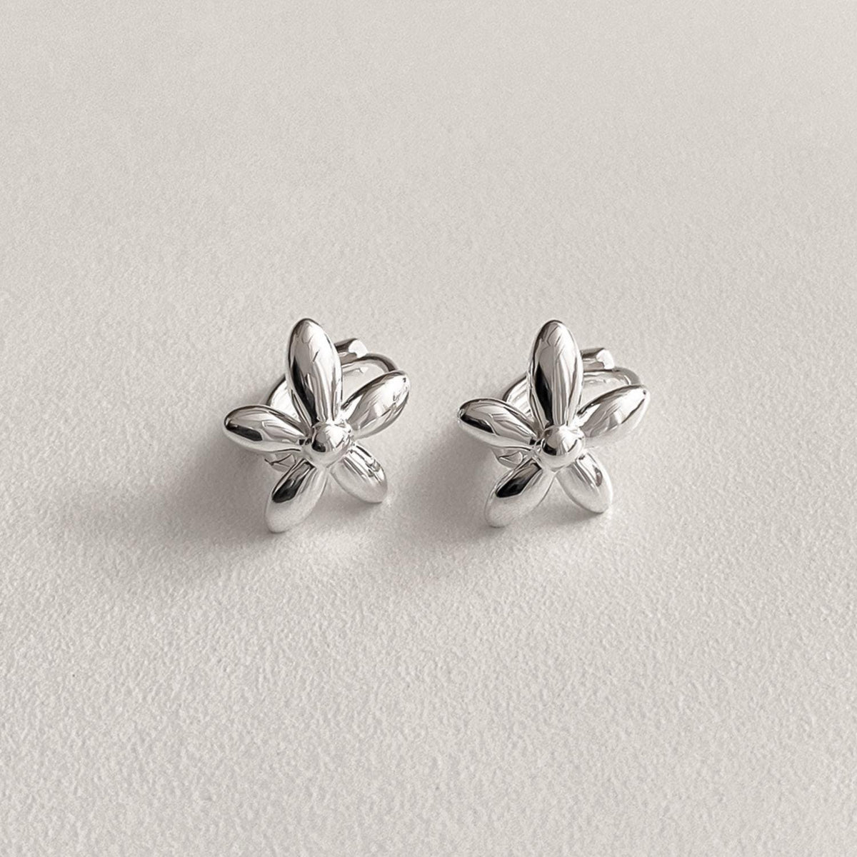 Bold Flower Huggie Earrings
