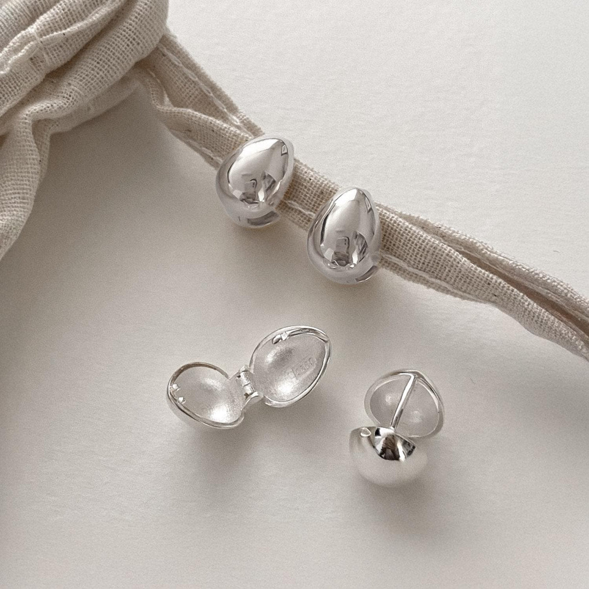 Teardrop Dome Huggie Earrings
