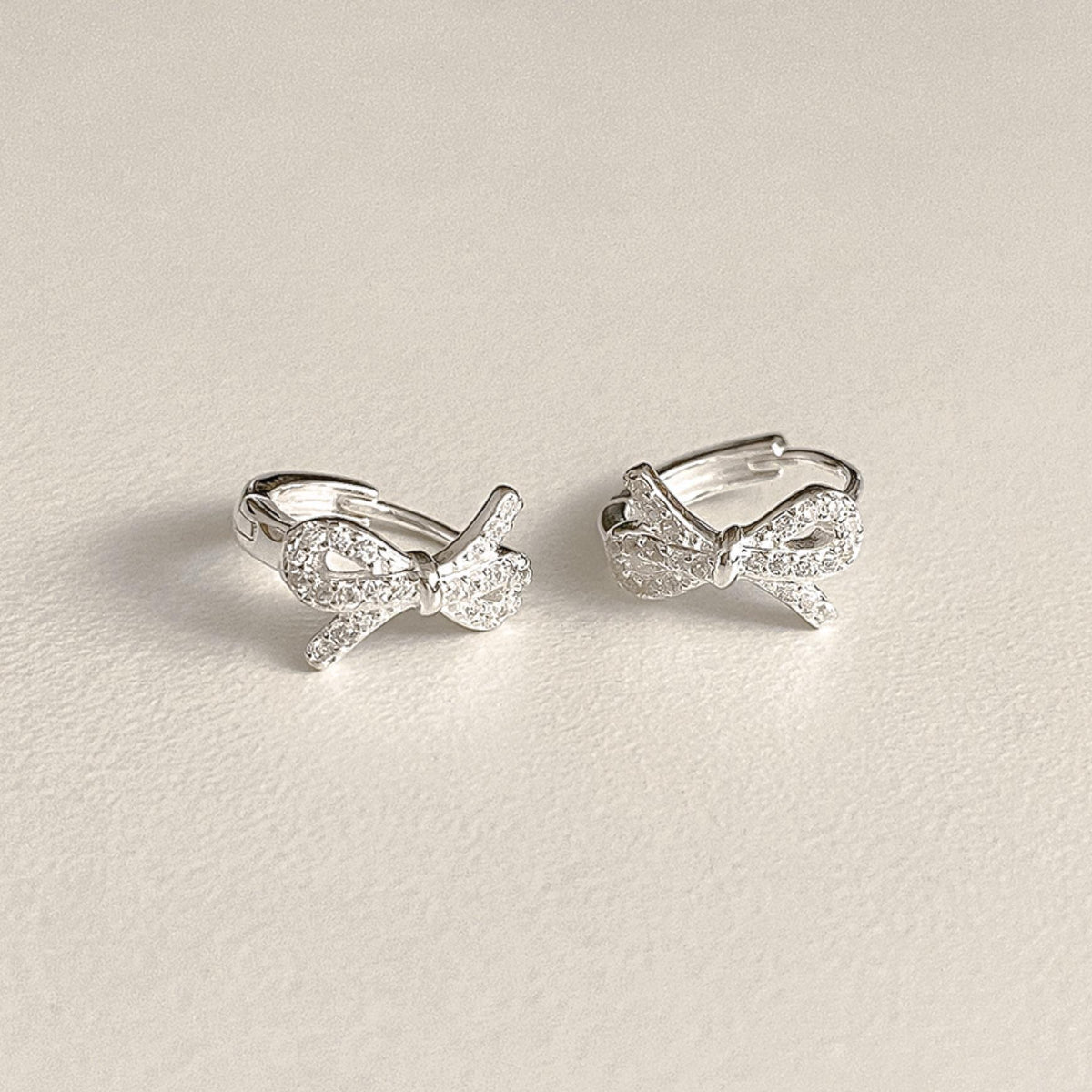 CZ Ribbon Huggie Earrings