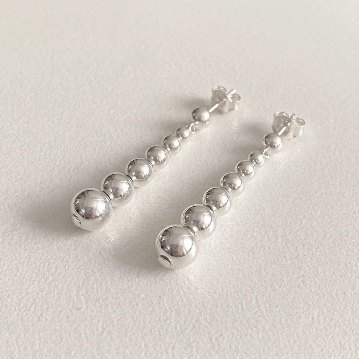 Graduated Silver Ball Drop Earrings