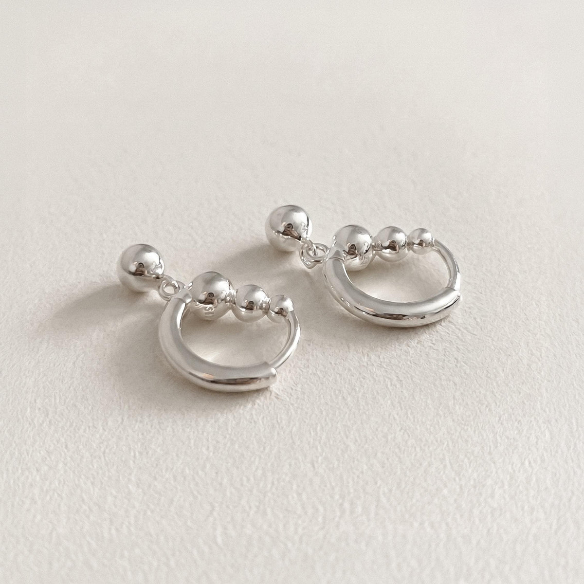 Silver Ball Charm Huggie Earrings